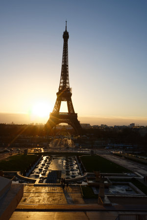Eiffel Tower and fountains near it at dawn in Paris.の写真素材