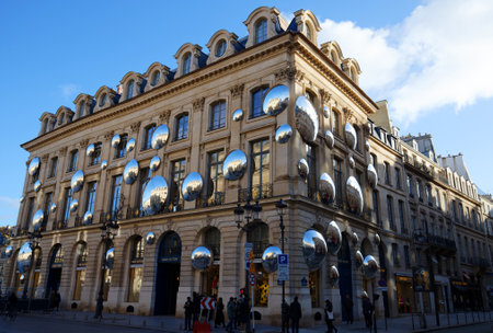 Luxury Boutique of Louis Vuitton at place Vendome in Paris, France. View of wonderful showcase.のeditorial素材