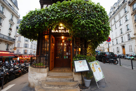 The traditional French restaurant Le Basilic located in picturesque Montmartre district of Paris.のeditorial素材