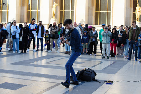 Street violonist on the Trocadero square in Paris, France