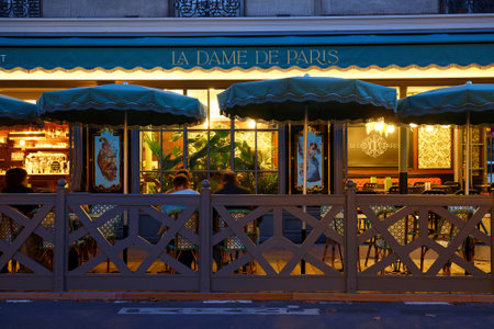 Typical Parisian restaurant La Dame de Paris at night located next to famous Notre Dame cathedral Paris, France.のeditorial素材