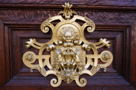European Vintage old metal wrought iron door knocker. Design detail. Paris.の写真素材