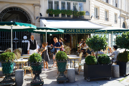 View of vintage parisian cafe de Belle epoque located in quarter of commercial Bourse in Paris, Franceのeditorial素材