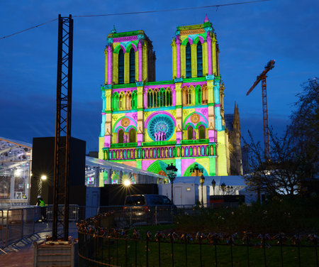 Notre Dame Cathedral in Paris will reopen following a five-year restoration after the 2019 fire. The cathedral will feature a rebuilt spire, restored interiors, and preserved historical elements.の写真素材