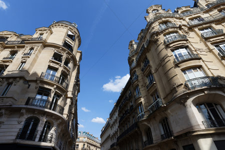 Paris, typical facades and windows, beautiful buildings, with old zinc roofsの写真素材