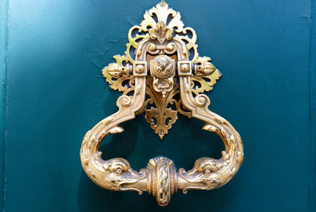 European Vintage old metal wrought iron door knocker. Design detail. Paris.Franceの写真素材