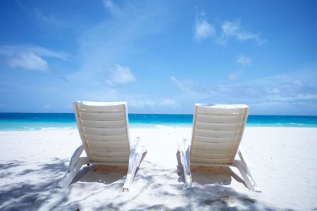 Canvas Chair on tropical beach の写真素材