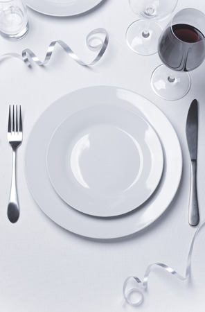 Celebration new year table set with red wineの写真素材