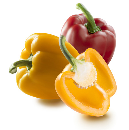 Red and yellow bell pepper plus half isolatedの写真素材
