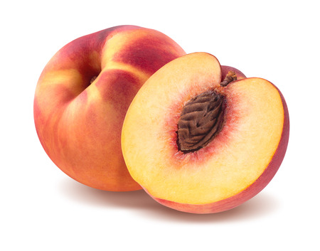 Fresh peach and half isolated on white background as package design elementの写真素材