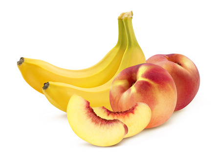 Banana and peach pieces isolated on white background as package design elementの写真素材