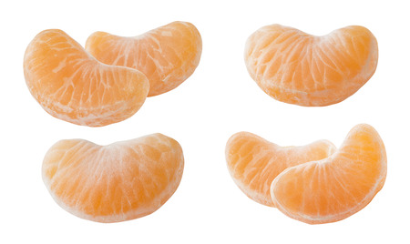Mandarin tangerine slices set isolated on white backgroundの写真素材