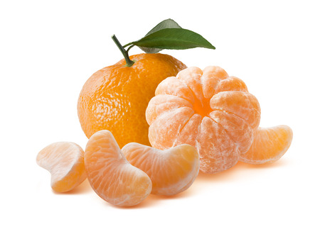 Whole orange mandarins peeled and unpeeled isolated on white backgroundの写真素材