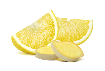 Lemon and ginger pieces isolated on white background as package design elementの写真素材