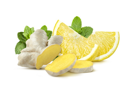 Ginger root, lemon quarters, mint leaves isolated on white background as package design elementの写真素材
