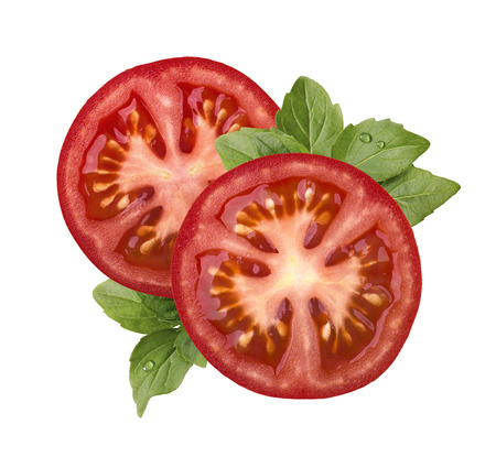 Tomato slice and basil isolated on white background as package design elementの写真素材