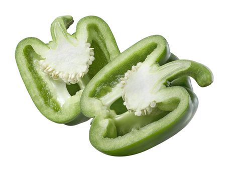 Green bell sweet pepper cut half isolated on white background as package design elementの写真素材