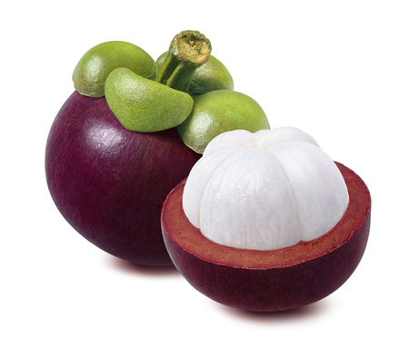Whole mangosteen and piece cut in half isolated on white background with clipping pathの写真素材