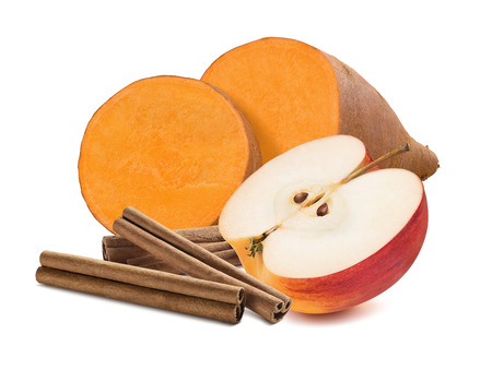 Sweet potato, cinnamon and red apple isolated on white background. With clipping path for package designの写真素材