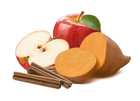 Sweet potato, cinnamon and red apple half isolated on white background. With clipping path for package designの写真素材