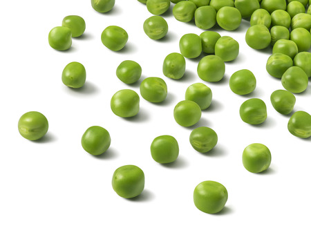 Scattered green peas over white background. Package design elements isolatedの写真素材