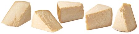 Block of parmesan cheese set isolated on whiteの写真素材