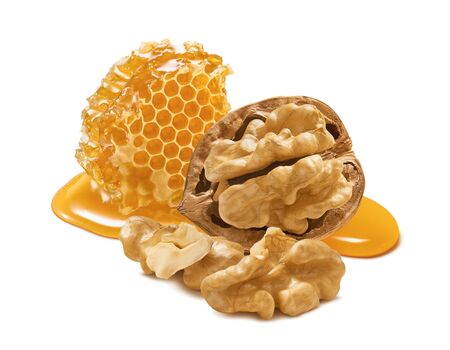 Walnut  and honeycomb isolated on white background. For products with nuts and honey ingredients. Package design element with clipping pathの写真素材