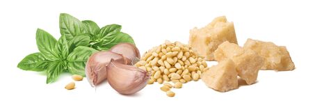 Fresh pesto ingredients, green basil leaves, garlic cloves, parmesan cheese and pine nuts isolated on whiteの写真素材
