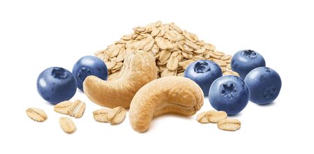 Blueberries, cashew and oat flakes isolated on white background. Oatmeal ingredients. Package design elementの写真素材