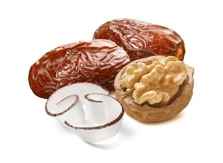Dates, walnut and coconut curl slices isolated on white background. Package design element with clipping pathの写真素材