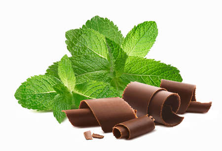 Chocolate curls and mint leaves isolated on white background. Package design element with clipping pathの写真素材