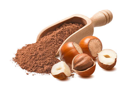 Hazelnut nuts and wooden scoop with cocoa powder isolated on white background. Package design element with clipping pathの写真素材