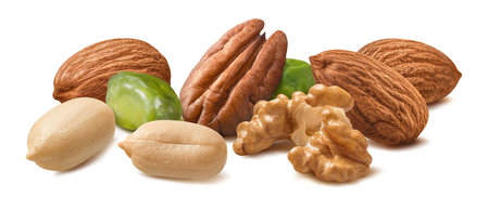 Big mix of nuts isolated on white background. Almond, peanuts, pistachio, pecan, walnuts. Package design element with clipping pathの写真素材
