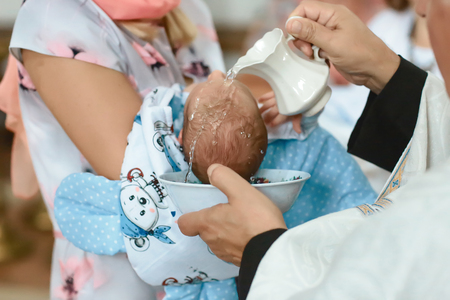 Baptism ceremony in Church, selective focus