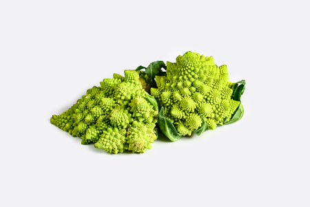 Romanesco broccoli cabbage, not fresh, faded. Nature fractal surface with spital pattern, Isolated on white background. place for text.の写真素材