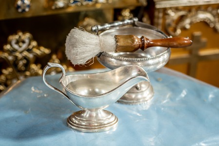 sacred water in the bowl. Bunch of consecration. Tools for baby baptism. Catholicism, the concept of...
