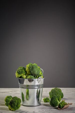 Fresh broccoli in the bowl. Healthy Green Organic Raw Broccoli. vertical image.の写真素材
