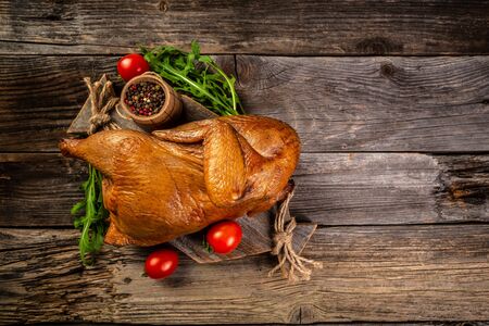 Smoked whole Chicken with a Golden. Rustic style. Turkish cuisine.の写真素材