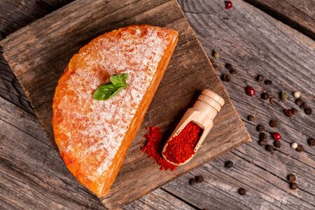 Mexicana spicy cheese. with chili and tomato wooden table, top view.の写真素材