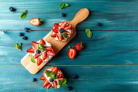 Strawberry shortcake pies, party individual fresh fruit dessert. Food recipe background. space for text. top view.の写真素材