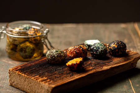 Marinated goat cheese with olive oil and, selective focus.の写真素材