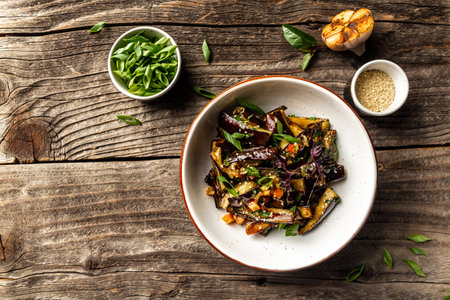 Vegetarian Salad with Baked Vegetables spicy stew eggplant in Korean style with green onion, Close Up. Grilled Eggplants.の写真素材