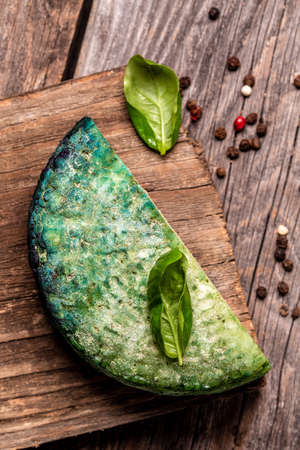 craft cheese green pesto cheese Pesto Rosso. Food recipe background. Close up vertical imageの写真素材