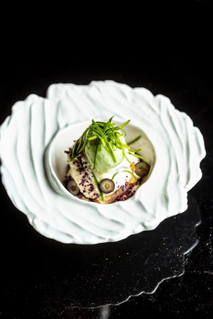 Green refreshing lime ice cream in white bowl vertical image.の写真素材