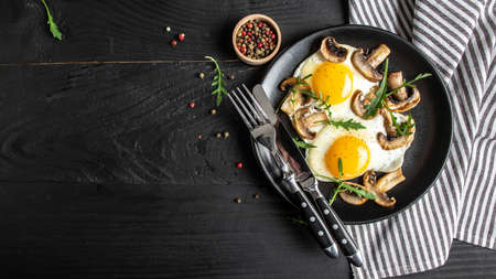 Keto, paleo breakfast scrambled eggs with mushrooms, banner, catering menu recipe place for text, top view.の写真素材