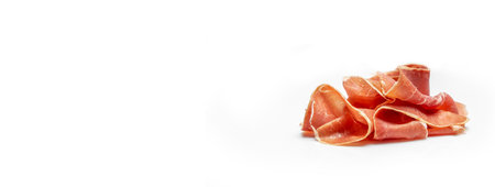 Dry Spanish ham, Jamon Serrano, Iberian ham Isolated on white background. Long banner format.の写真素材