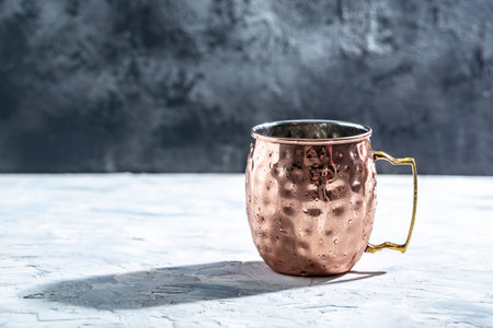 Shiny copper Moscow Mule mug with handle. Hammered Vintage Copper Mug.の写真素材