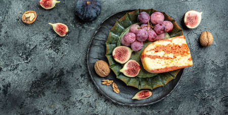Marble delicous cheese served figs, grapes and walnuts, banner, menu, recipe place for text, top view,の写真素材