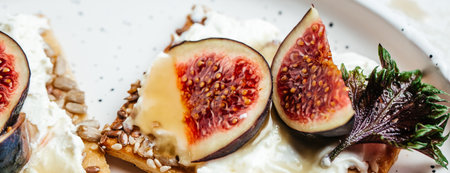 Fresh pastries with cream cheese and figs. Clean eating, dieting or recipe of healthy snack sandwich for vegaterian.の写真素材