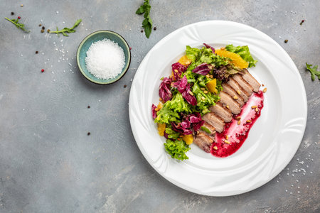 Duck breast, baked duck fillet with berry sauce and salad, banner, menu, recipe place for text, top view,の写真素材